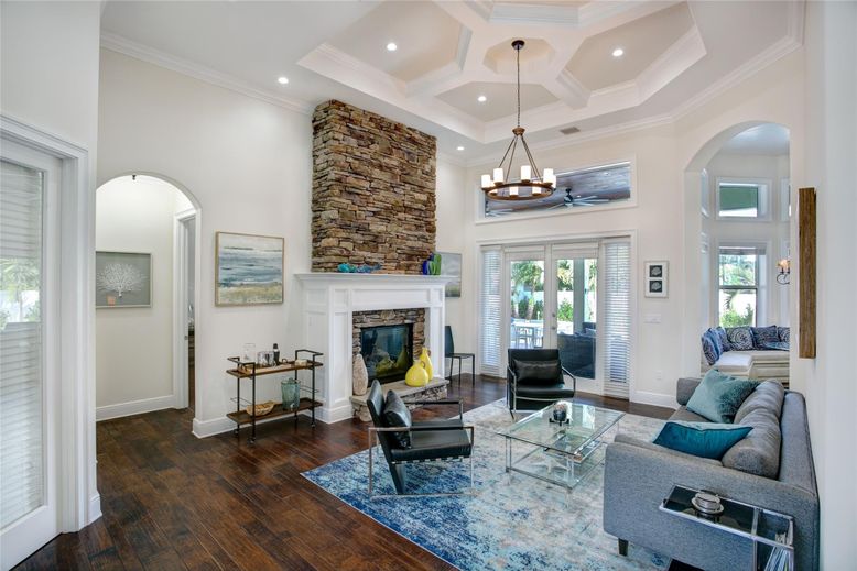 Chandelier, Fireplace, Interior, Living room, Recessed Lighting, Wood Texture Flooring