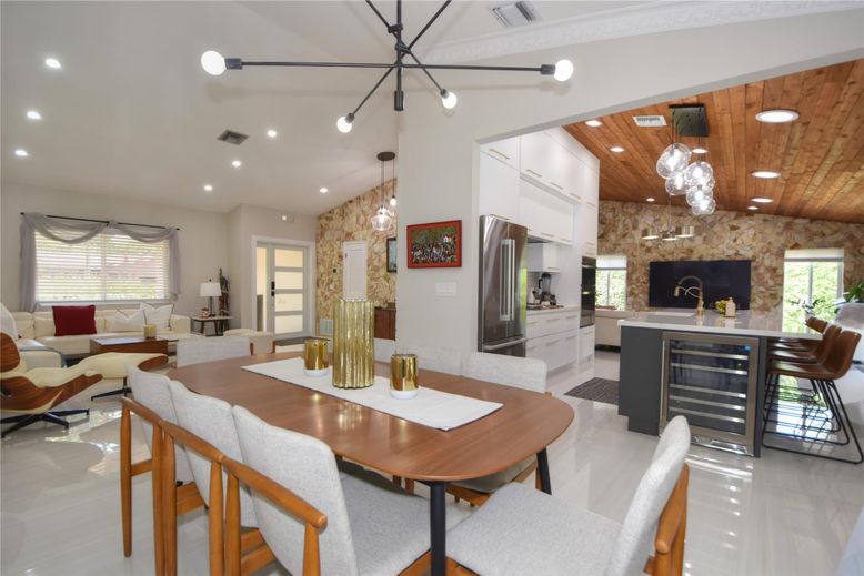 Dining room, Interior, Kitchen, Living room, Pendant Lights, Recessed Lighting, Stainless Steel Appliances, Wooden Ceilings