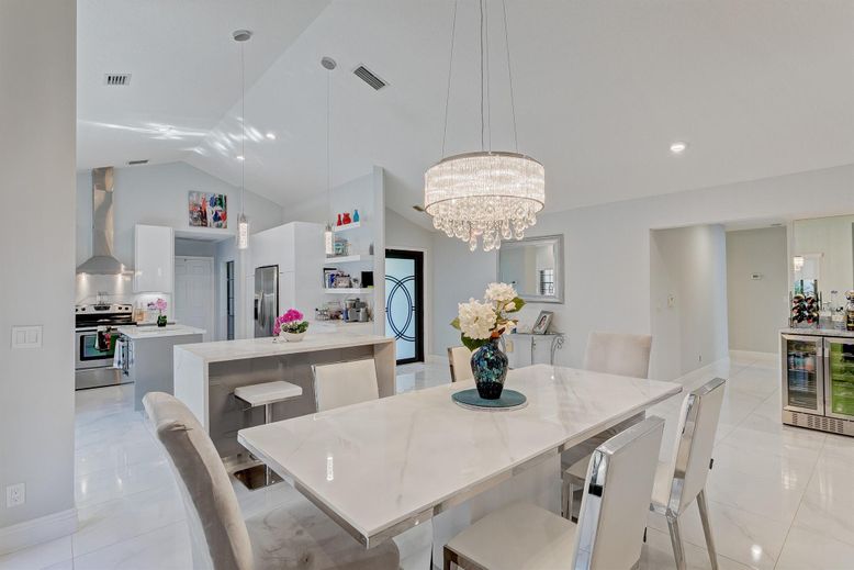 Chandelier, Dining room, Interior, Kitchen, Marble, Pendant Lights, Recessed Lighting, Stainless Steel Appliances
