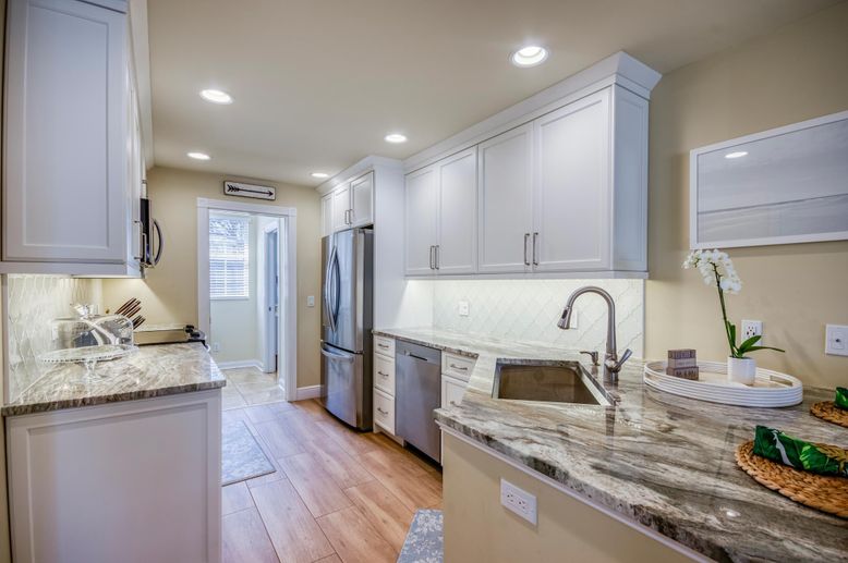 Interior, Kitchen, Recessed Lighting, Stainless Steel Appliances, Wood Texture Flooring