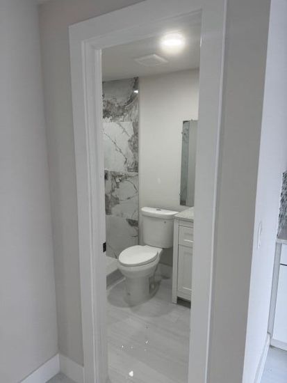 Bathroom, Interior, Marble, Marble Walls, Recessed Lighting, Wood Texture Flooring