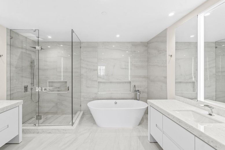 Bathroom, Dual Sink Vanities, Free Standing Baths, Glass Shower, Interior, Marble, Marble Walls, Recessed Lighting