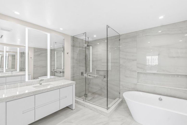 Bathroom, Dual Sink Vanities, Free Standing Baths, Glass Shower, Interior, Marble, Marble Walls, Recessed Lighting