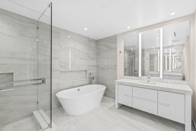 Bathroom, Dual Sink Vanities, Free Standing Baths, Glass Shower, Interior, Marble, Marble Walls, Recessed Lighting