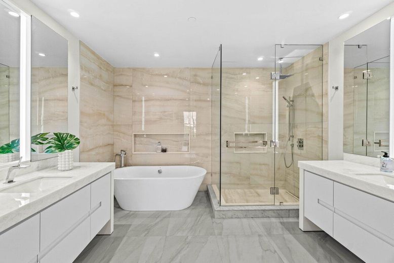 Bathroom, Dual Sink Vanities, Free Standing Baths, Glass Shower, Interior, Marble, Marble Walls, Recessed Lighting