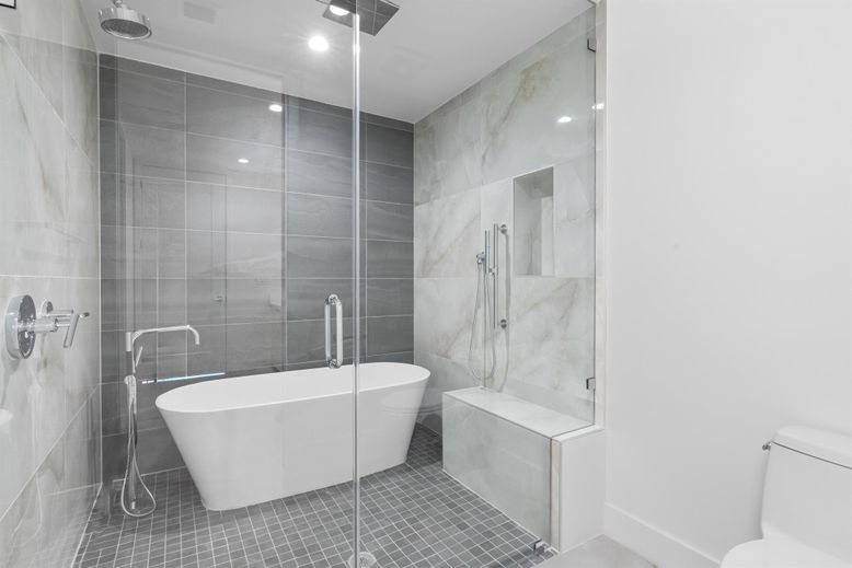 Bathroom, Free Standing Baths, Glass Shower, Interior, Marble Walls, Recessed Lighting