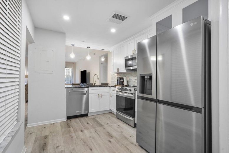 Interior, Kitchen, Pendant Lights, Recessed Lighting, Stainless Steel Appliances, Wood Texture Flooring