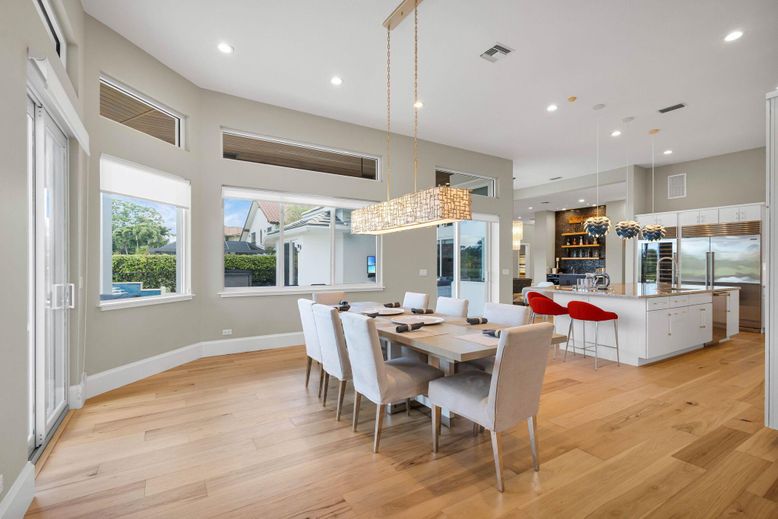 Chandelier, Dining room, Interior, Kitchen, Pendant Lights, Recessed Lighting, Stainless Steel Appliances, Wood Texture Flooring