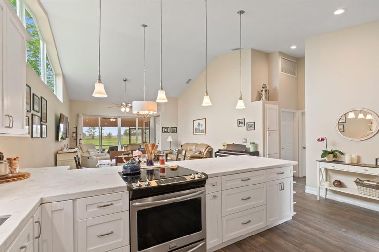 Dining room, Interior, Kitchen, Living room, Pendant Lights, Recessed Lighting, Stainless Steel Appliances, Wood Texture Flooring