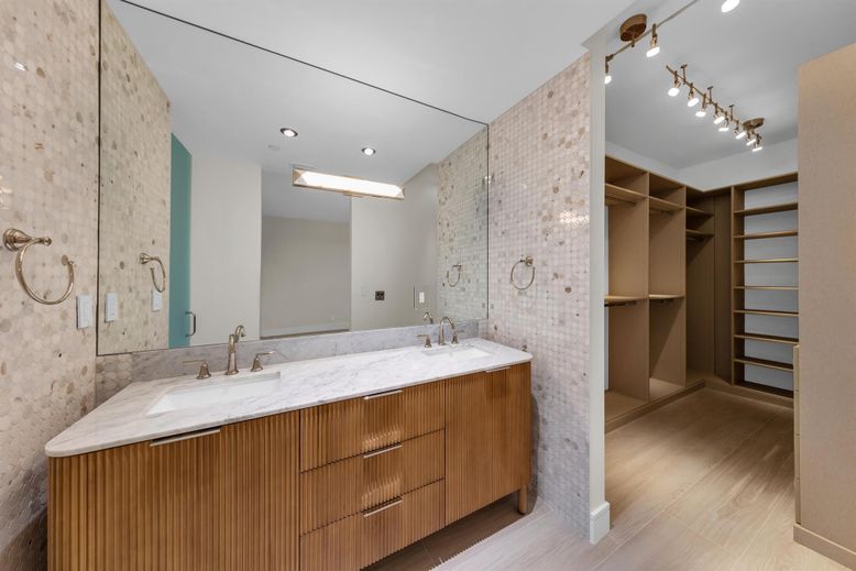 Bathroom, Dual Sink Vanities, Glass Shower, Interior, Recessed Lighting, Walk-in Closets, Wood Texture Flooring