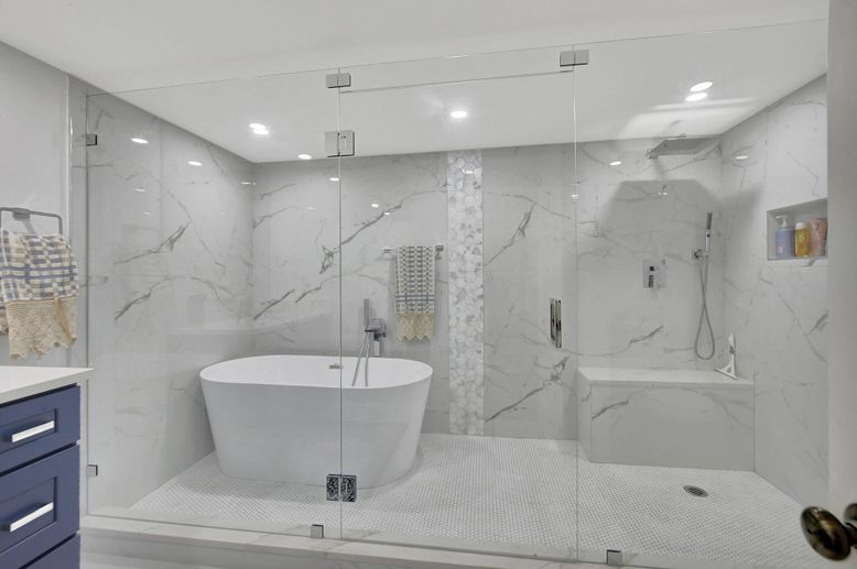 Bathroom, Free Standing Baths, Glass Shower, Interior, Marble Walls, Recessed Lighting
