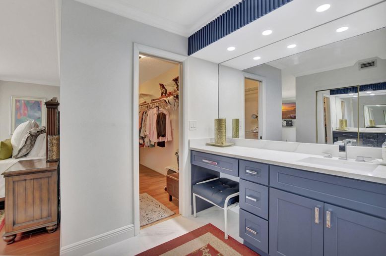 Bathroom, Dual Sink Vanities, Interior, Recessed Lighting, Walk-in Closets, Wood Texture Flooring