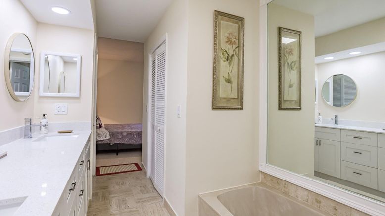 Bathroom, Dual Sink Vanities, Interior, Recessed Lighting, Wood Texture Flooring