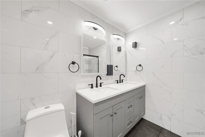 Bathroom, Dual Sink Vanities, Interior, Marble Walls, Recessed Lighting
