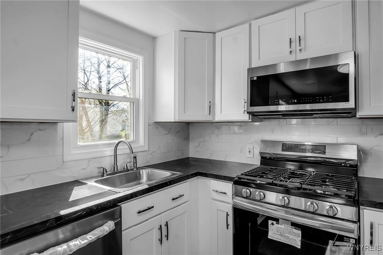 Interior, Kitchen, Marble Walls, Stainless Steel Appliances