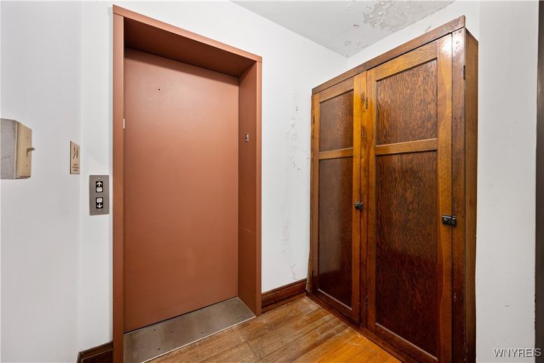 Elevator, Interior, Wood Texture Flooring