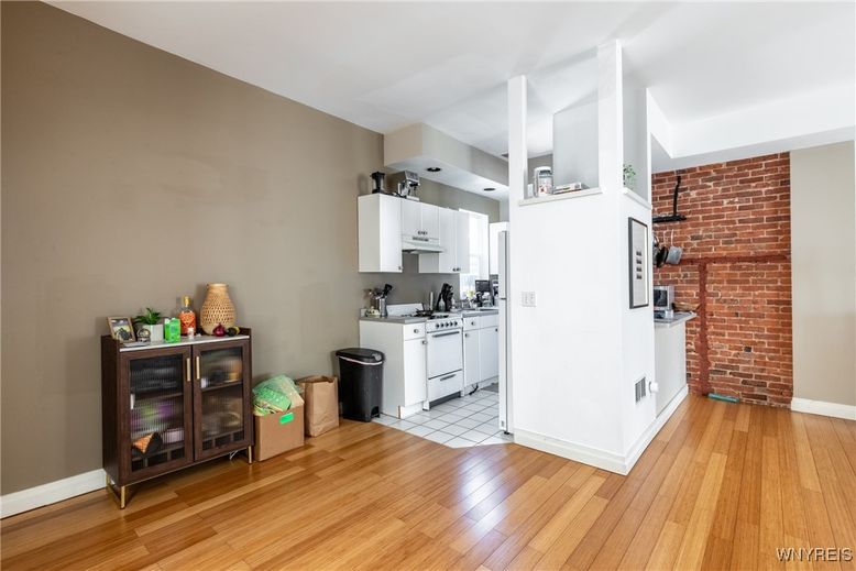 Interior, Kitchen, Stone Walls, Washer, Wood Texture Flooring