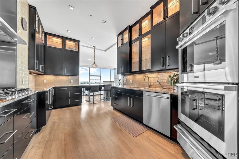 Dining room, Interior, Kitchen, Pendant Lights, Recessed Lighting, Stainless Steel Appliances, Wood Texture Flooring