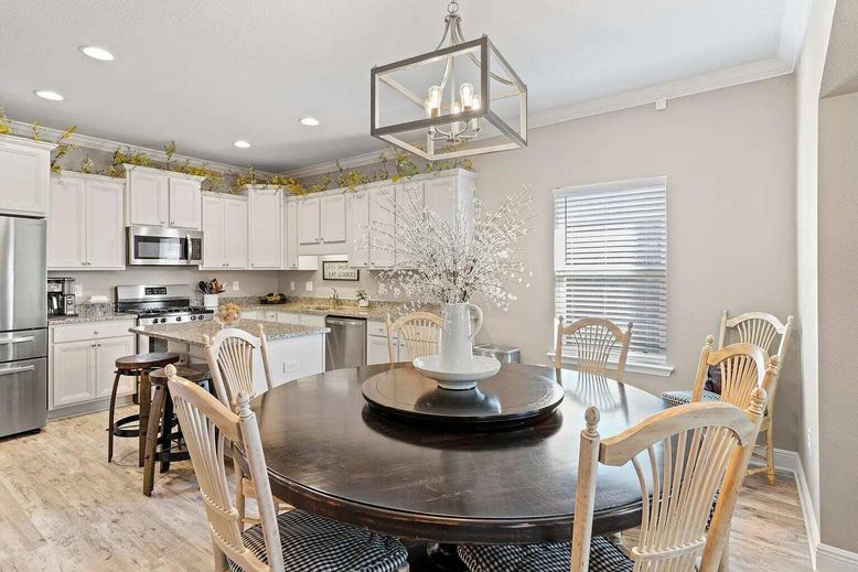 Dining room, Interior, Kitchen, Pendant Lights, Recessed Lighting, Stainless Steel Appliances, Wood Texture Flooring