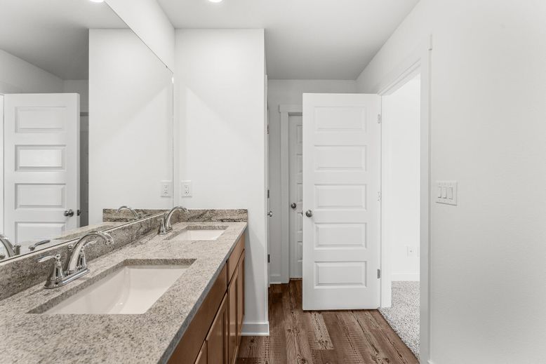 Bathroom, Dual Sink Vanities, Interior, Recessed Lighting, Wood Texture Flooring