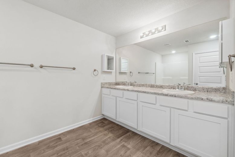 Bathroom, Dual Sink Vanities, Interior, Recessed Lighting, Wood Texture Flooring