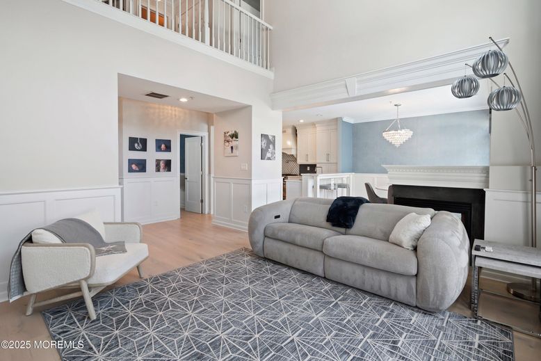 Chandelier, Dining room, Fireplace, Interior, Kitchen, Living room, Recessed Lighting, Wood Texture Flooring