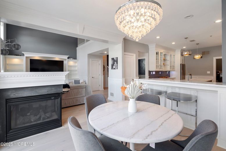 Chandelier, Dining room, Fireplace, Interior, Kitchen, Pendant Lights, Recessed Lighting, Wood Texture Flooring