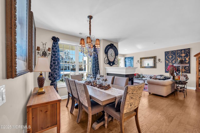 Chandelier, Dining room, Fireplace, Interior, Living room, Piano, Wood Texture Flooring