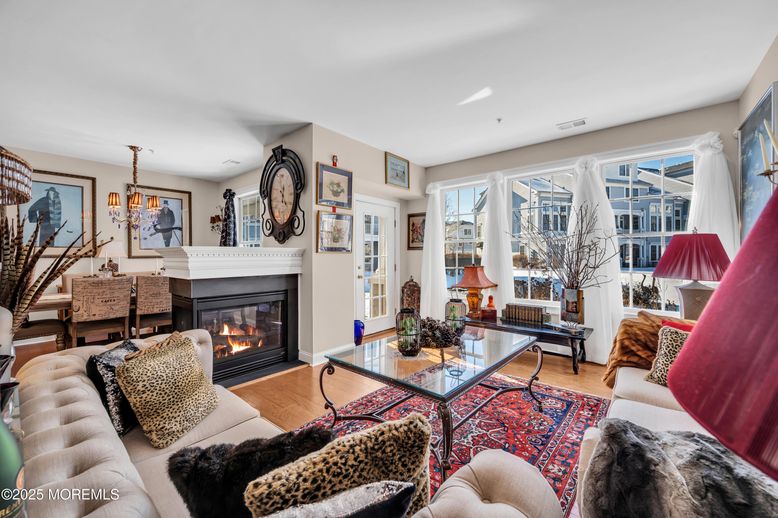 Dining room, Fireplace, Interior, Living room, Pendant Lights, Recessed Lighting, Wood Texture Flooring