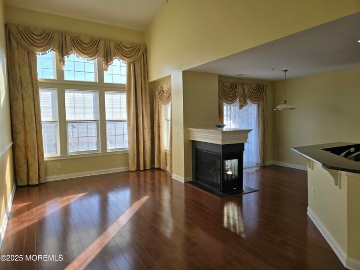 Empty room, Fireplace, Interior, Pendant Lights, Wood Texture Flooring