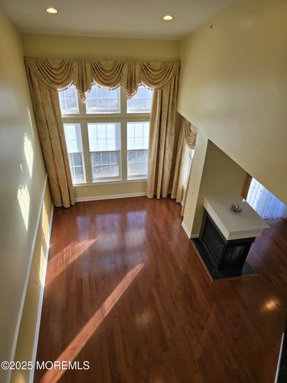 Empty room, Fireplace, Interior, Recessed Lighting, Wood Texture Flooring