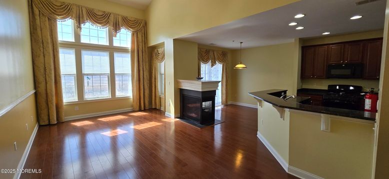 Fireplace, Interior, Kitchen, Pendant Lights, Recessed Lighting, Wood Texture Flooring