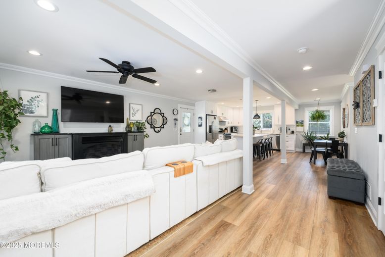 Dining room, Interior, Kitchen, Living room, Pendant Lights, Recessed Lighting, Stainless Steel Appliances, Wood Texture Flooring