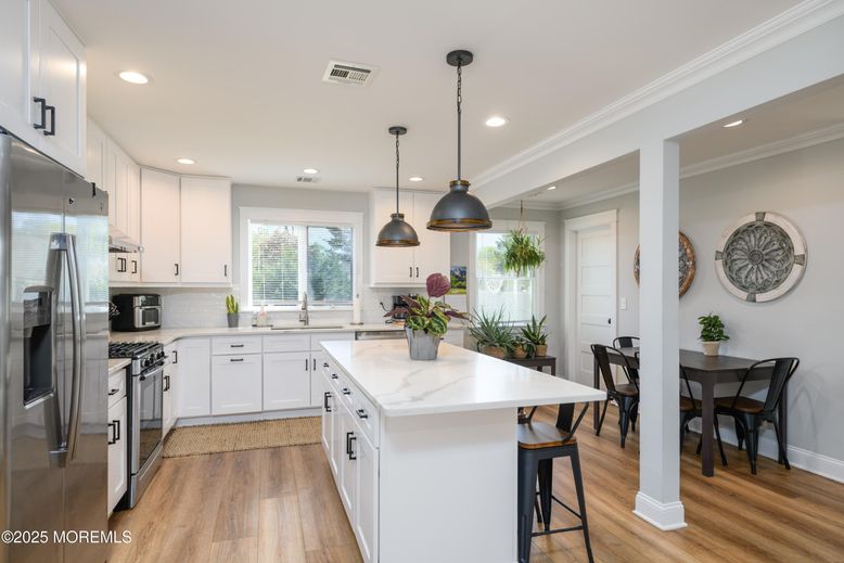 Interior, Kitchen, Pendant Lights, Recessed Lighting, Stainless Steel Appliances, Wood Texture Flooring
