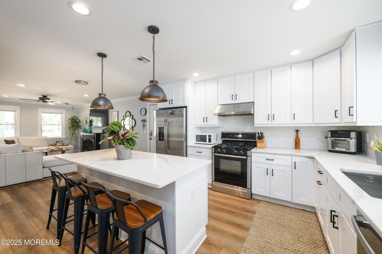 Interior, Kitchen, Living room, Pendant Lights, Recessed Lighting, Stainless Steel Appliances, Wood Texture Flooring