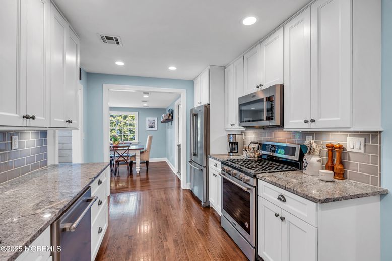 Dining room, Interior, Kitchen, Recessed Lighting, Stainless Steel Appliances, Wood Texture Flooring