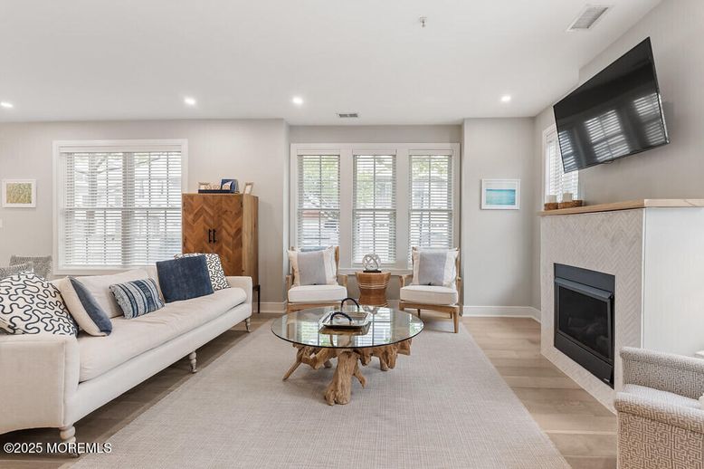 Fireplace, Interior, Living room, Recessed Lighting, Wood Texture Flooring