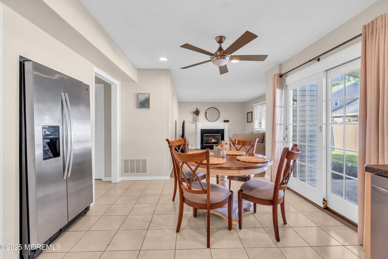 Dining room, Fireplace, Interior, Recessed Lighting, Stainless Steel Appliances