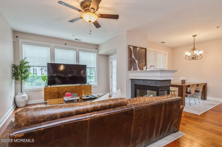 Chandelier, Dining room, Fireplace, Interior, Living room, Wood Texture Flooring