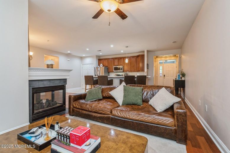 Dining room, Fireplace, Interior, Kitchen, Living room, Recessed Lighting, Wood Texture Flooring