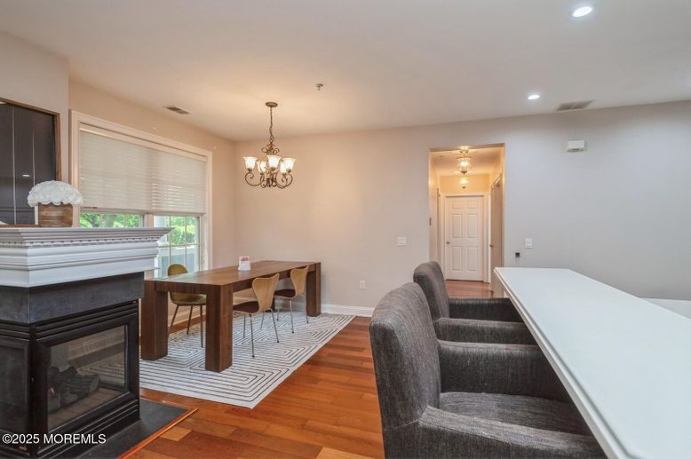 Chandelier, Dining room, Fireplace, Interior, Recessed Lighting, Wood Texture Flooring