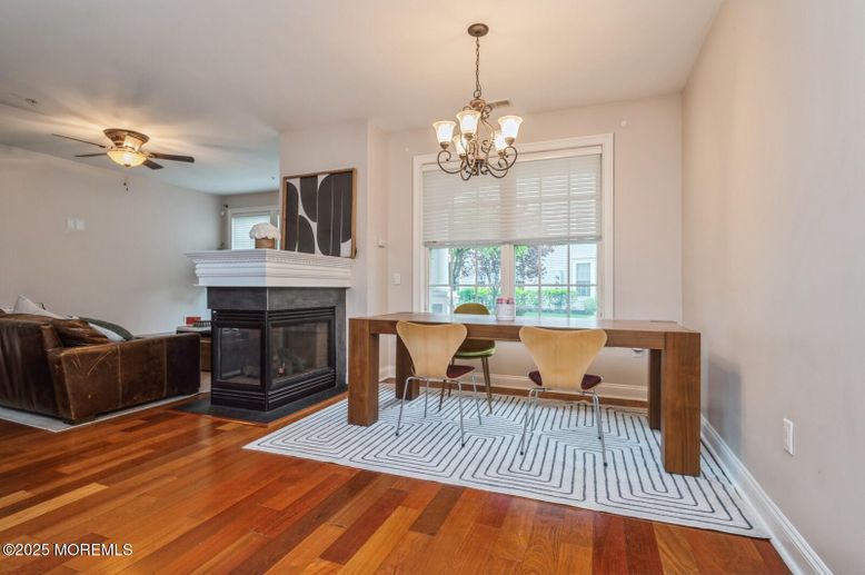 Chandelier, Dining room, Fireplace, Interior, Wood Texture Flooring