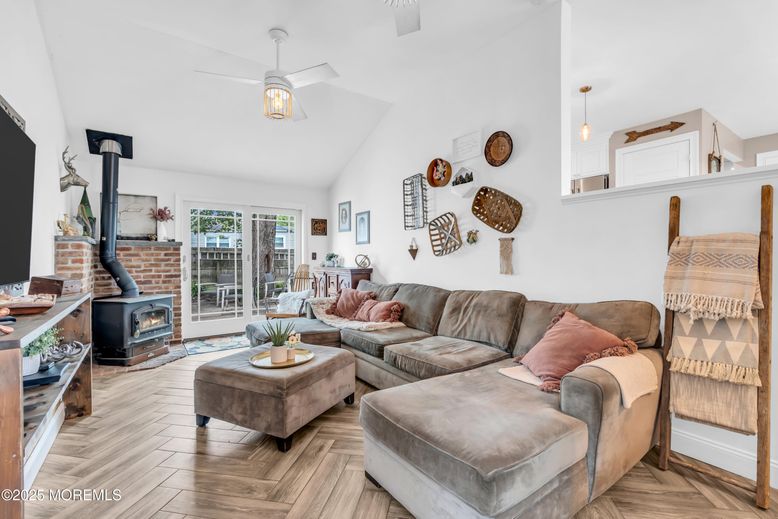 Fireplace, Interior, Living room, Pendant Lights, Stone Walls, Wood Texture Flooring