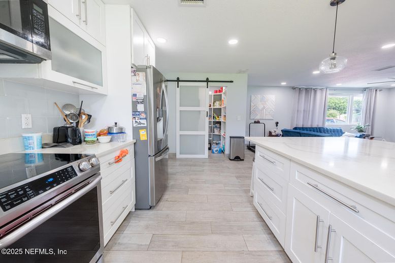 Interior, Kitchen, Pendant Lights, Recessed Lighting, Stainless Steel Appliances, Wood Texture Flooring