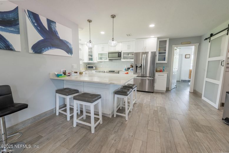 Interior, Kitchen, Pendant Lights, Recessed Lighting, Stainless Steel Appliances, Wood Texture Flooring