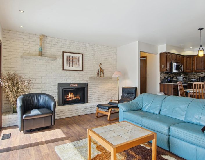 Fireplace, Interior, Kitchen, Living room, Pendant Lights, Recessed Lighting, Stone Walls, Wood Texture Flooring