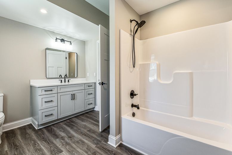 Bathroom, Dual Sink Vanities, Interior, Recessed Lighting, Wood Texture Flooring