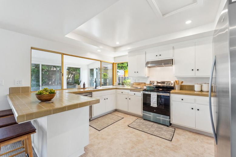 Interior, Kitchen, Recessed Lighting, Stainless Steel Appliances, Tile Countertops