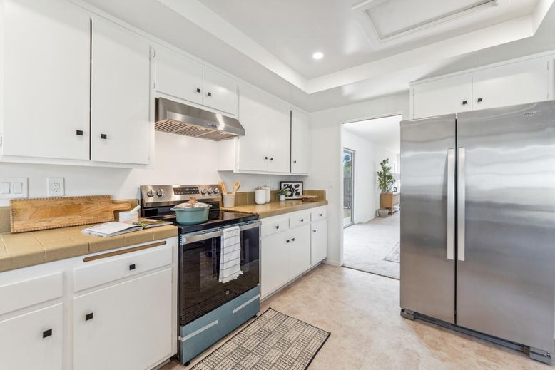 Interior, Kitchen, Recessed Lighting, Stainless Steel Appliances, Tile Countertops