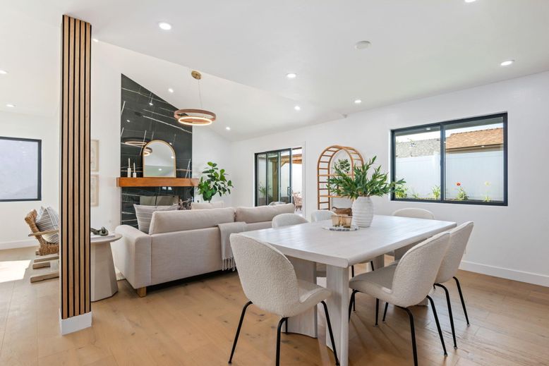 Dining room, Fireplace, Interior, Living room, Pendant Lights, Recessed Lighting, Wood Texture Flooring